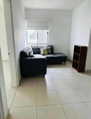 Zona de estar de Departamento olivas