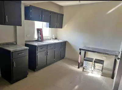 Una cocina o zona de cocina en Departamento olivas