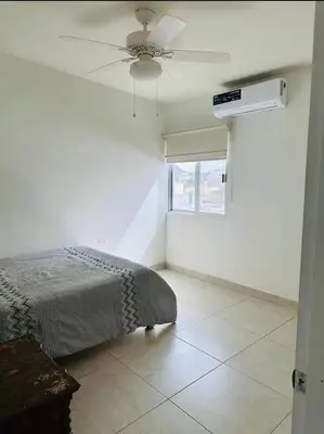 Cama o camas de una habitación en Departamento olivas
