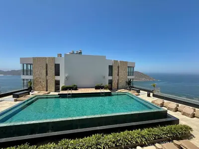 Piscina en o cerca de Departamento moderno a pie de playa