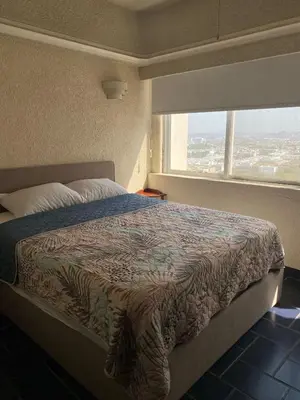 Cama o camas de una habitación en Departamento en Mazatlan zona dorada a PIE DE PLAYA
