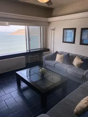 Zona de estar de Departamento en Mazatlan zona dorada a PIE DE PLAYA