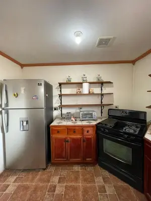 Una cocina o zona de cocina en Casa De la Rosa