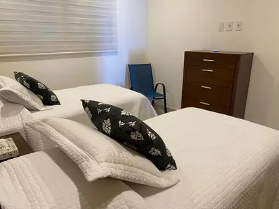 Cama o camas de una habitación en Lujoso y Bonito Apartamento a Orilla de Playa