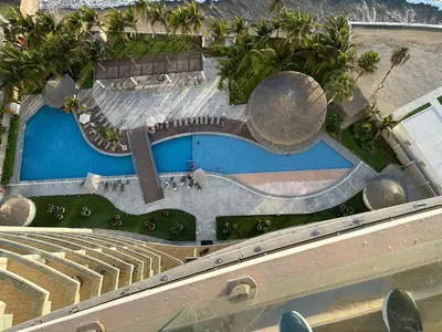 Piscina en o cerca de Lujoso y Bonito Apartamento a Orilla de Playa