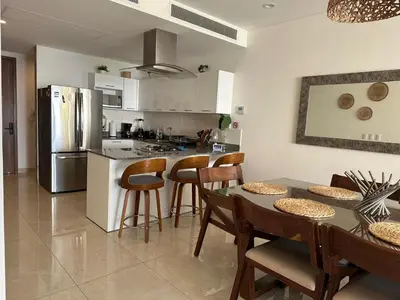 Una cocina o zona de cocina en Lujoso y Bonito Apartamento a Orilla de Playa