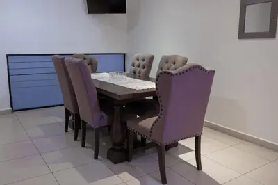 Una televisión o centro de entretenimiento en Apartamentos Torre II Condominios - Pet Friendly