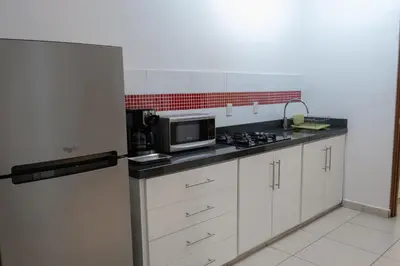 Una cocina o zona de cocina en Apartamentos Torre II Condominios - Pet Friendly