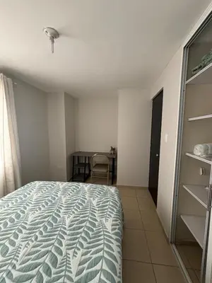 Cama o camas de una habitación en Casa Ceiba-Hospital Angeles