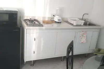 Una cocina o zona de cocina en Depa 22 Loft Acceso Directo en Torre Belén