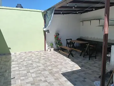 Un patio o zona al aire libre en Casa linda y acogedora, a 3 min Distrito Uno