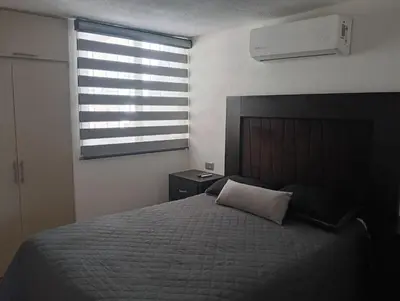 Cama o camas de una habitación en Casa linda y acogedora, a 3 min Distrito Uno