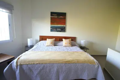Cama o camas de una habitación en Stylish Home with Roof-Top Patio - Historic Centre