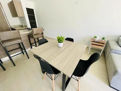 Zona de estar de Tropical Condo - Close to Beach and Waterpark