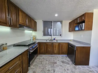 Una cocina o zona de cocina en Pool Park Ocean - Centro Home