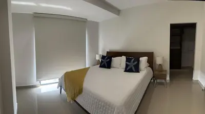 Cama o camas de una habitación en Departamento cerca del Malecón