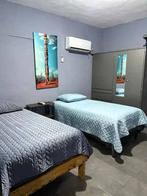 Cama o camas de una habitación en Departamento Mateos 503