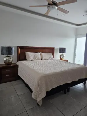 Cama o camas de una habitación en Departamento estilo Hotel