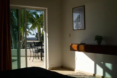 Un balcón o terraza de Departamentos y cabañas a pie de playa -Baraka Beach Club
