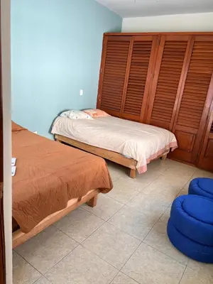 Cama o camas de una habitación en Casa en zona dorada