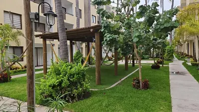 Jardín al aire libre en Mazatlan Executive Apartment