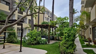 Jardín al aire libre en Mazatlan Executive Apartment