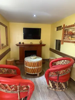 Una televisión o centro de entretenimiento en Casita de Lety