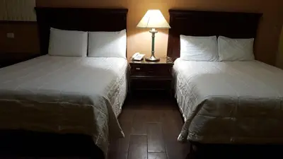 Cama o camas de una habitación en Hotel La Posta