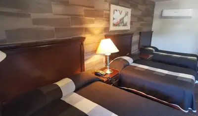 Cama o camas de una habitación en Hotel La Posta
