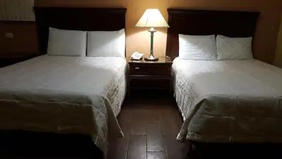 Cama o camas de una habitación en Hotel La Posta