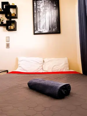 Cama o camas de una habitación en Golden Vintage Room , Paseo Durango