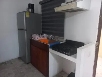 Una cocina o zona de cocina en Departamento a metros de la playa