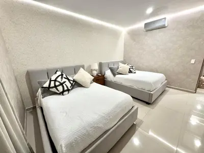 Cama o camas de una habitación en Condominio de Lujo con Impresionante Vista al Mar