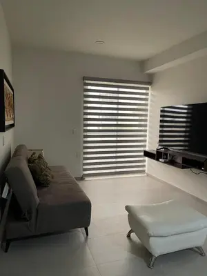 Una televisión o centro de entretenimiento en Bluu Habitat Lagoons En Mazatlan DEPARTAMENTO