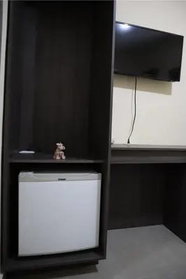 Una televisión o centro de entretenimiento en Departamento en residencial privada