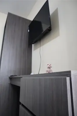 Una televisión o centro de entretenimiento en Departamento en residencial privada
