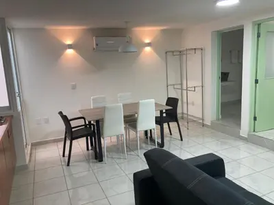 Zona de estar de Luxurious Minimalist Apartment in Mazatlns Historic Center