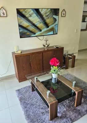 Una televisión o centro de entretenimiento en Torre Pórtico #1 de Lujo - Frente Playa y Malecón