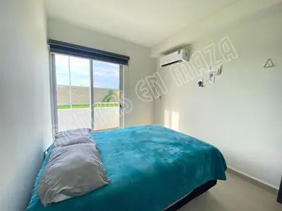 Cama o camas de una habitación en Residencial Bluú Habitat Lagoon 3