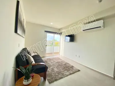 Una televisión o centro de entretenimiento en Residencial Bluú Habitat Lagoon 3