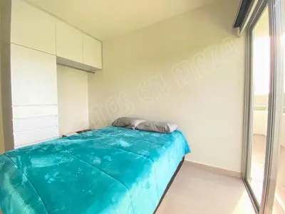 Cama o camas de una habitación en Residencial Bluú Habitat Lagoon 3