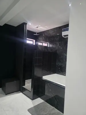 Un baño de Cataleya Suites Cassandra