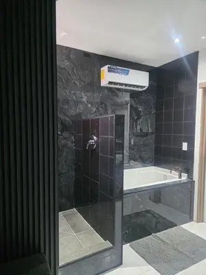 Un baño de Cataleya Suites Cassandra