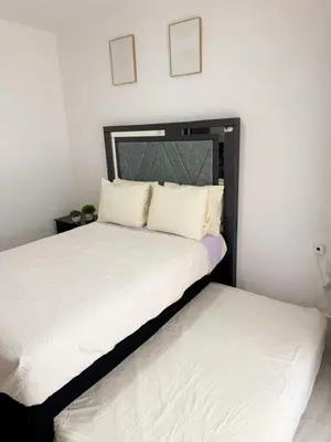 Cama o camas de una habitación en Marina Cerritos - Azul del Mar - 5 Albercas