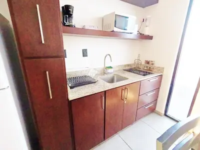 Una cocina o zona de cocina en Soho Turquesa Depto Moderno Malecón y Playas 1 Min