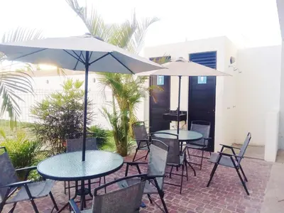 Un patio o zona al aire libre en Soho Turquesa Depto Moderno Malecón y Playas 1 Min