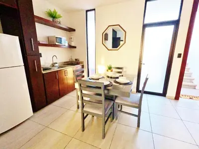 Una cocina o zona de cocina en Soho Turquesa Depto Moderno Malecón y Playas 1 Min