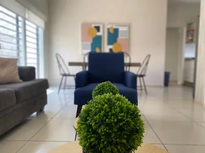 Zona de estar de Casa Familiar con Alberca en Privada, 5 min del Aeropuerto y Consulado Americano