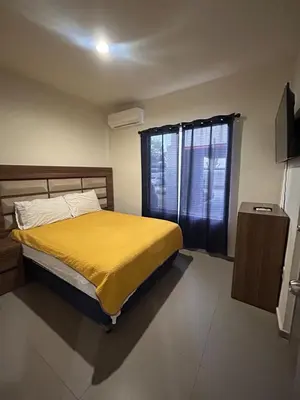 Cama o camas de una habitación en Apartamento en Zona Playa Cerritos