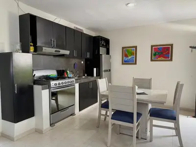 Una cocina o zona de cocina en Alojamiento a pocas calles de la playa